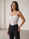 Corset de concha con broches traseros