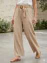 Pantaloneta de tela arrugada con cinto