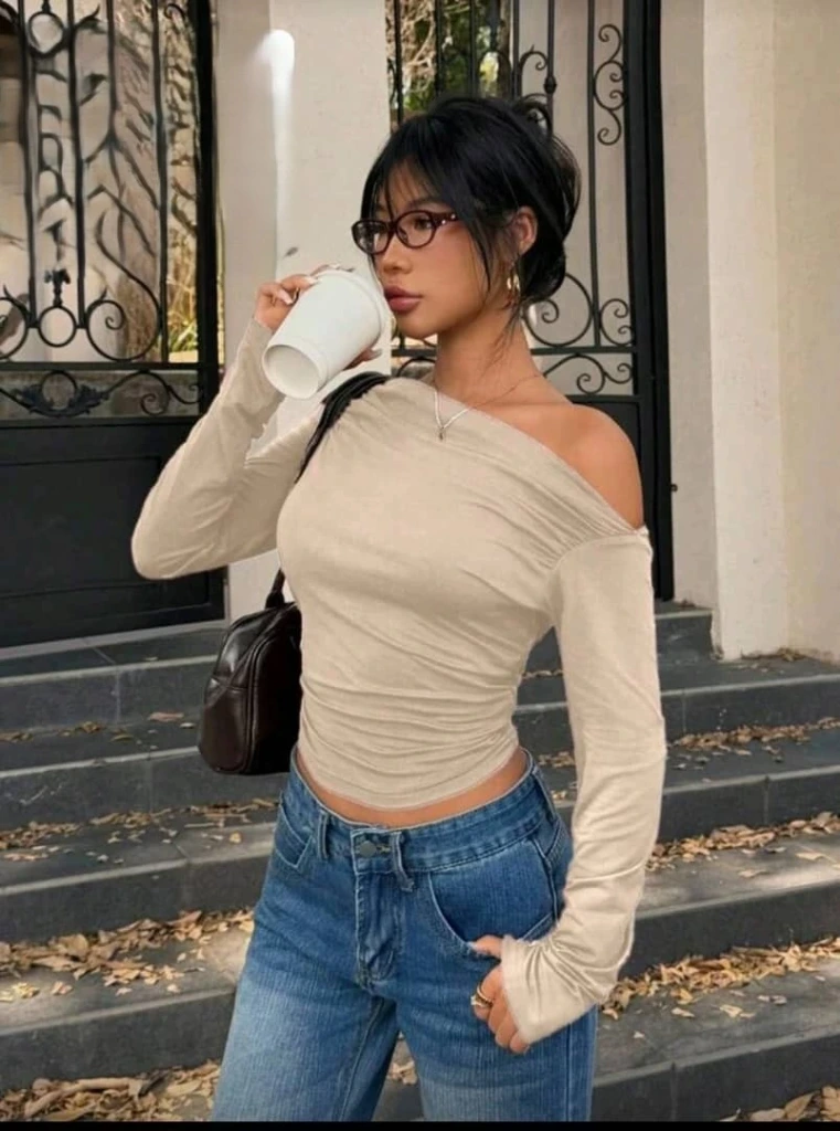 Blusa de mangas largas hombro caído