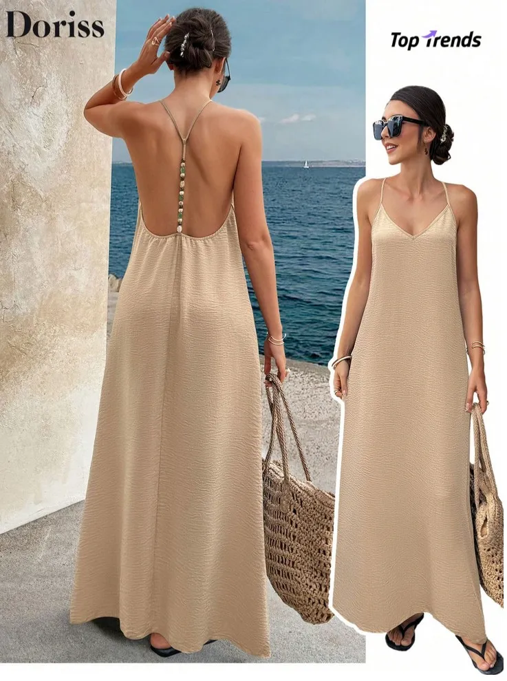 Vestido amplio largo con espalda descubierta y piedras