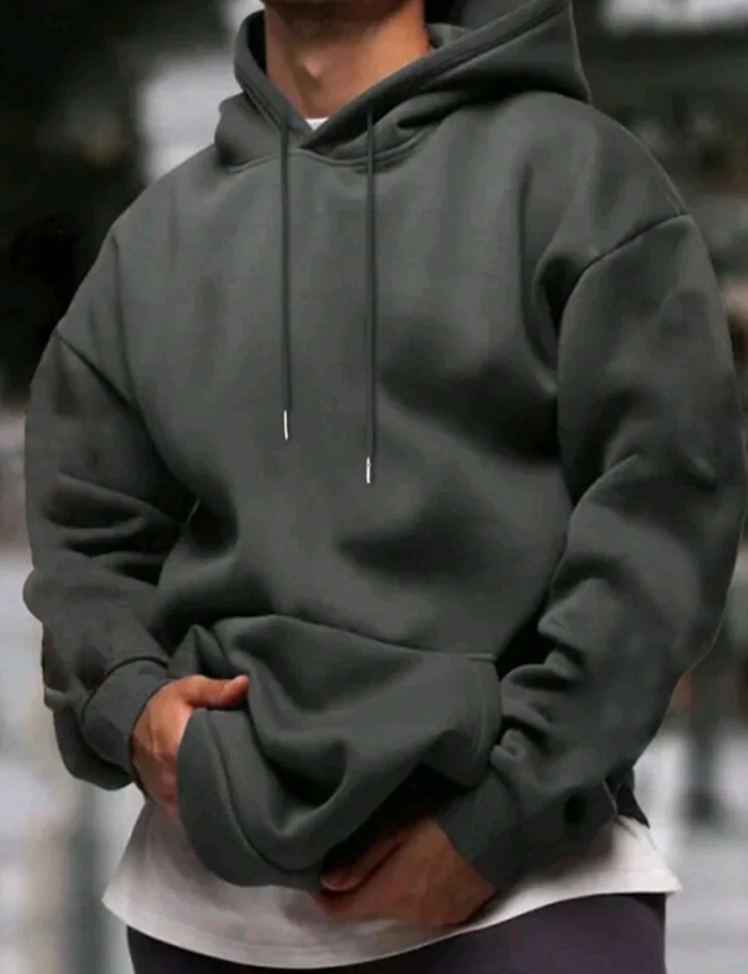 Abrigo de hombre con capucha y bolsillo delantero sin cierre