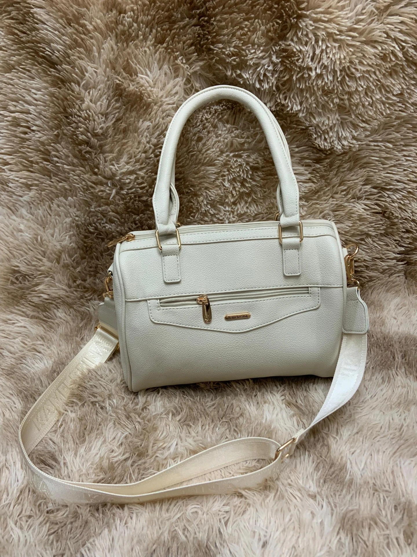 Cartera mediana ovalada con tirante largo Blanca